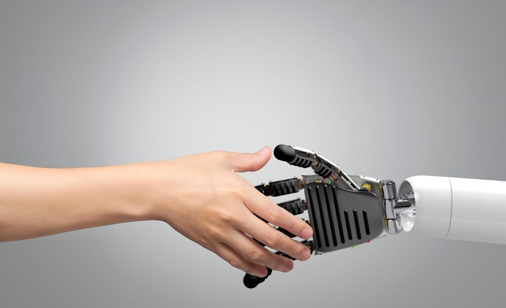 a human hand and an AI shaking hands